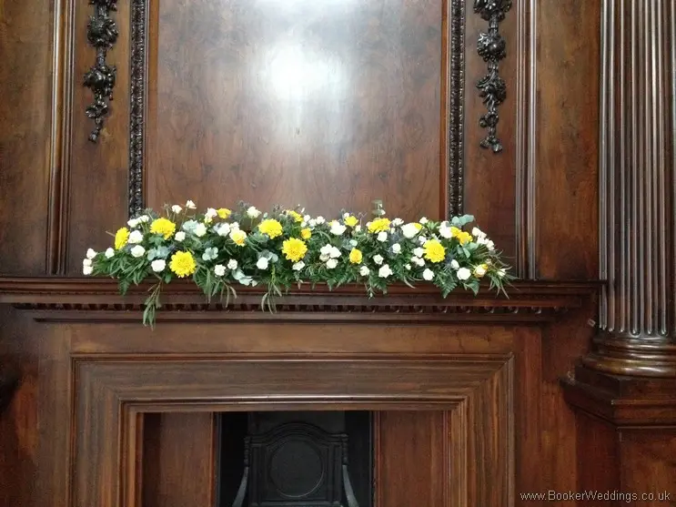 Gold, Peach and Navy Wedding Reception Flowers, Mantlepiece Decoration with Roses, Crysanthemum, Eryngium and Eucalyptus at Aloft Hotel
