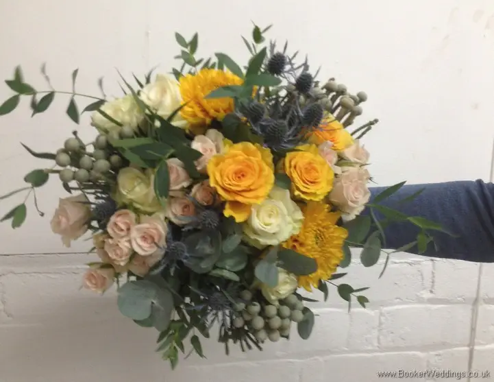 Wild Just Picked Garden Flowers with Gold, peach and Navy Brides Hand tied Bouquet with Roses, Spray roses, Eryngium, Brunia Berries and Eucalyptus