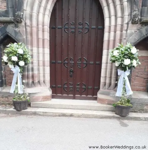 Church Entrance Bay Trees With Hydrangeas And Bows