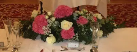 Cerise Hydrangea and White Rose Top Table Arrangement Back View