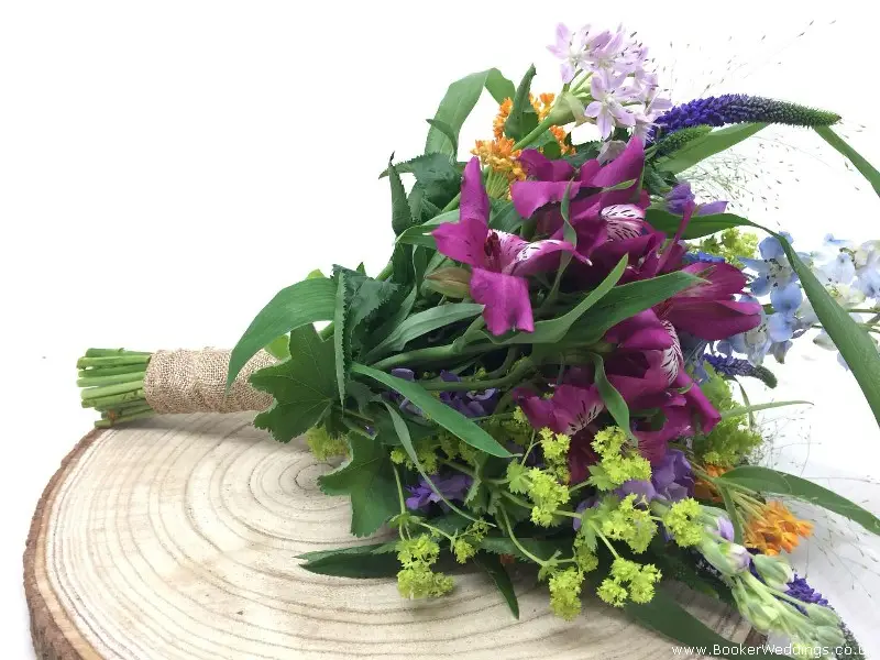 Bridesmaid Bouquet Of Delphinium Stocks Veronica Solidaster Alstromeria Fountain Grass Pistachie Alliums And Asclepias