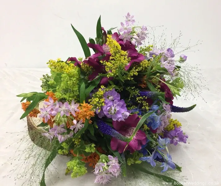 Colourful Bride Bouquet Of Delphinium Stocks Veronica Solidaster Alstromeria Fountain Grass Pistachie Alliums And Asclepias