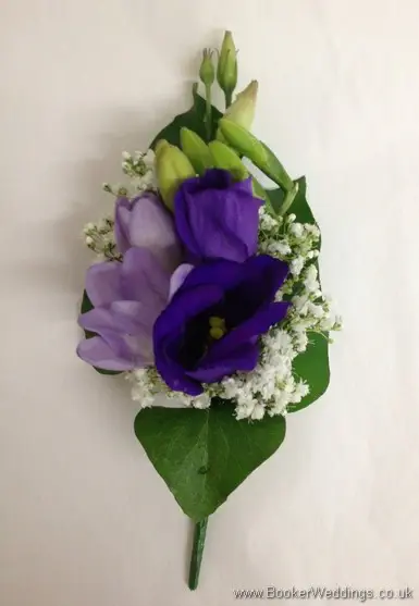 Purple and cream Pin Corsage with purple lissianthus, lilac freesia and gypsophila