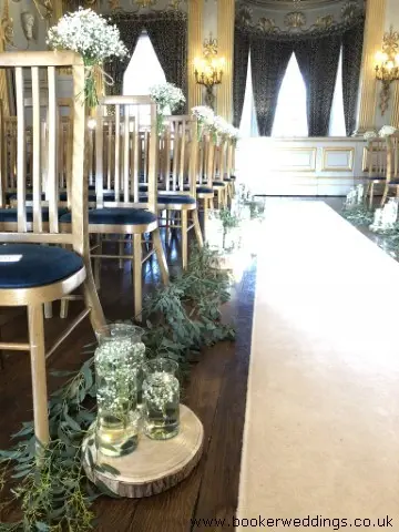 Aisle dressed with Floating Candles and Gypsophila