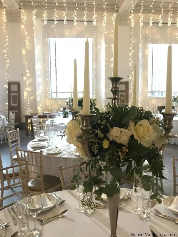 Candelabra Dressed with Roses and Euc Trails
