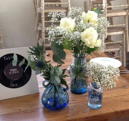 Jar Table Arangments Rose Eryngium and Gypsophilia 6