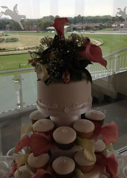 Pink and white calla lily cake arrangement close up