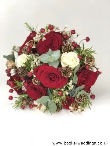 Bride Bouquet of Red and White Roses Berries and Cones