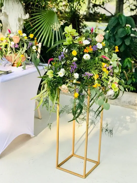 Tall Pedestal Arrangement at Palm House Wedding Fair