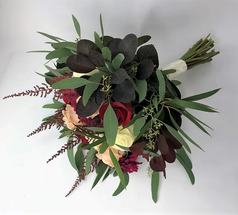 Romantic Pink and Red Rose Brides Bouquet with Burgundy Foliage