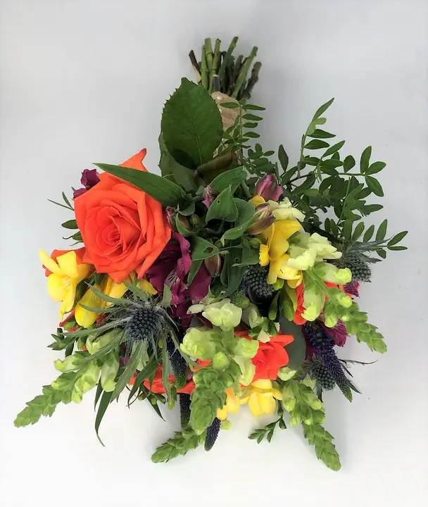 Vibrant Summer Brides Handtied Posy with Orange Roses