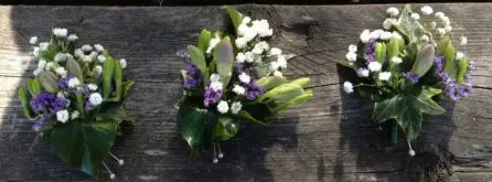 Lilac Freesia and Gypsophila Corsages