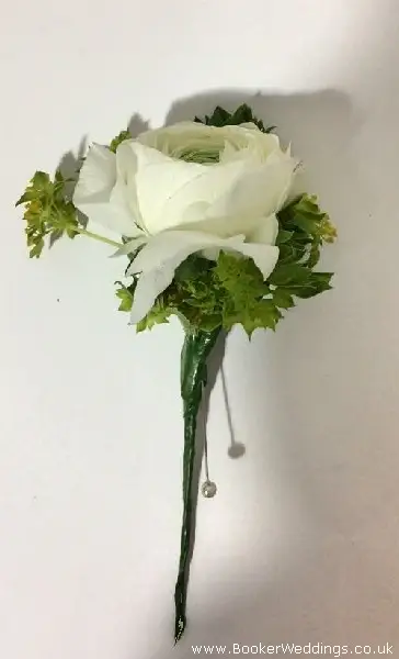 Buttonhole using ranunculus and burperlum ideal for wedding party