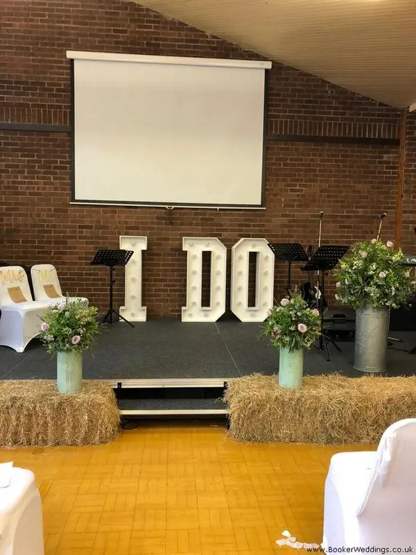 Church Flowers for Rustic Wedding with Hay Bales