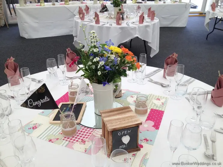 Just Picked Meadow Flowers Jug Table Centrepieces with Yellow Crysanthemums, Orange Spray Roses, White Aster Daisy and Blue Delphiniums at Speke Hall, Liverpool