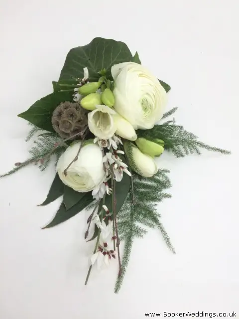 White Freesia Ranunculus And Genistia Corsage