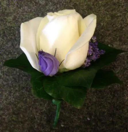Purple and white Grooms Buttonhole