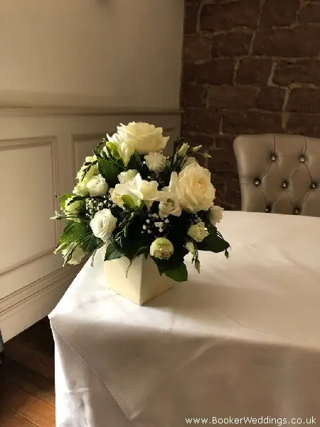 Wedding Ceremony Flowers in Ivory and Green for Wedding Venue