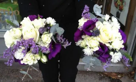 Purple and white flower girl bouquets