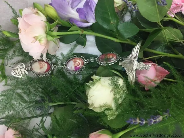 Sentimental Wedding Charms on Bride Bouquet