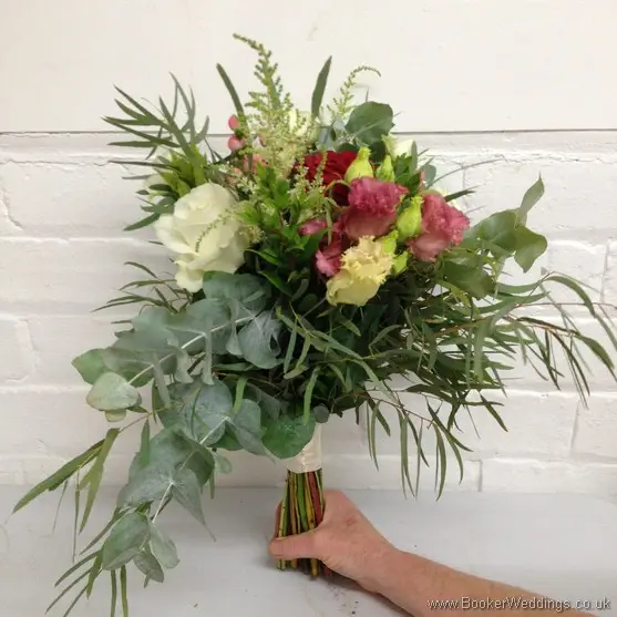 Cream, Coral and Burgundy Wild Flower and Foliage Hand Tied Bridesmaid Bouquet with Roses, Lissianthus, Hypericum berries, Astilbe and Eucalyptus Side View
