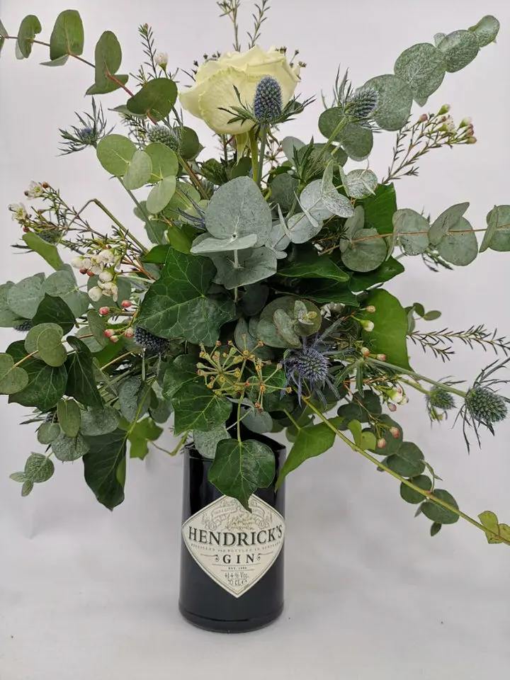 Gin Bottle Wedding Table Flowers