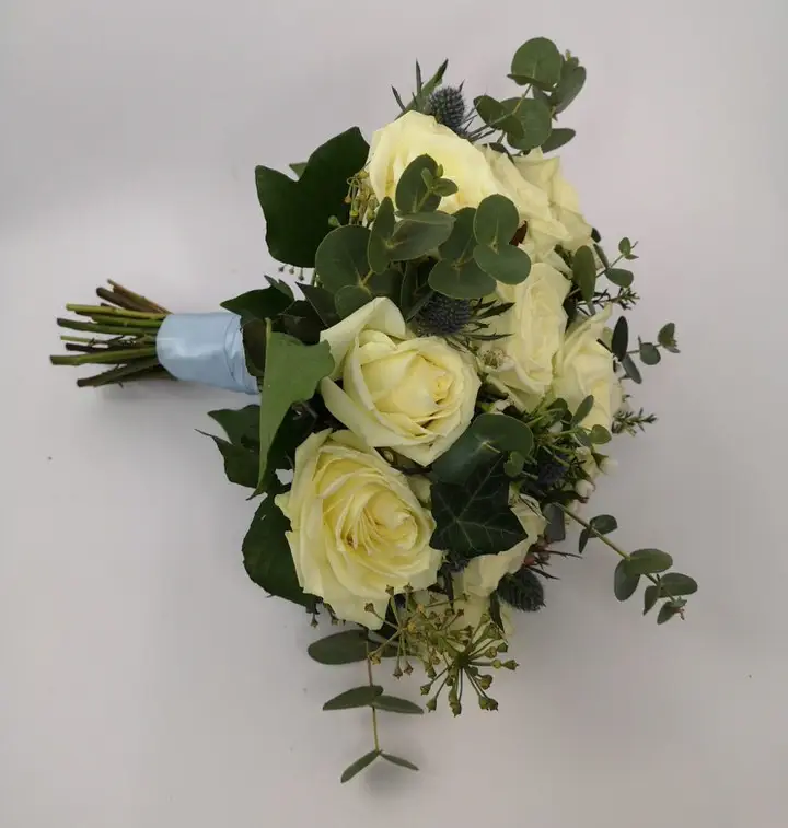 White and Blue Bride Bouquet with Avalanche Roses