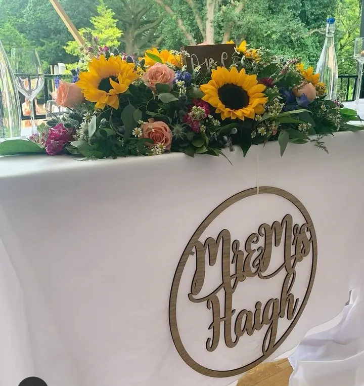 Top Table Arrangment with Sunflowers and Vibrant Flowers