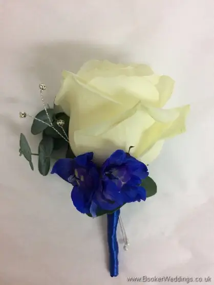 Mothers fancy buttonhole of ivory rose and blue flowers with diamante jewels_2