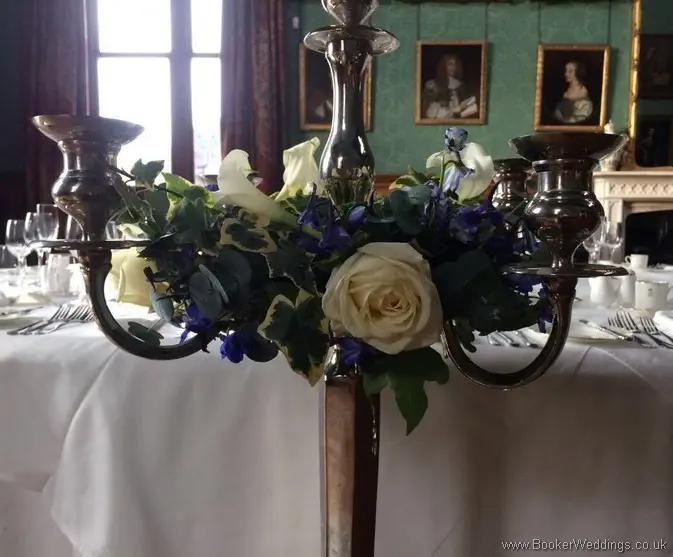 Tall Candelabra arrangments with white and blue flowers at Knowsley Hall_close up