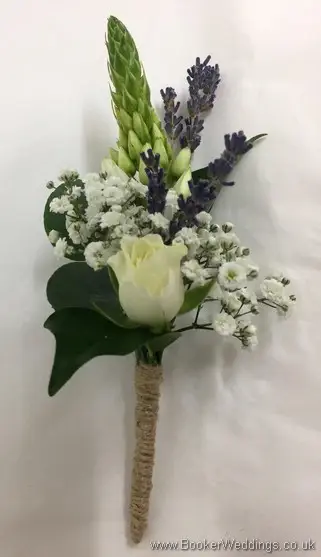 Grooms semi-wild buttonhole with chincherinchee, lavender, gypsophila and spray rose