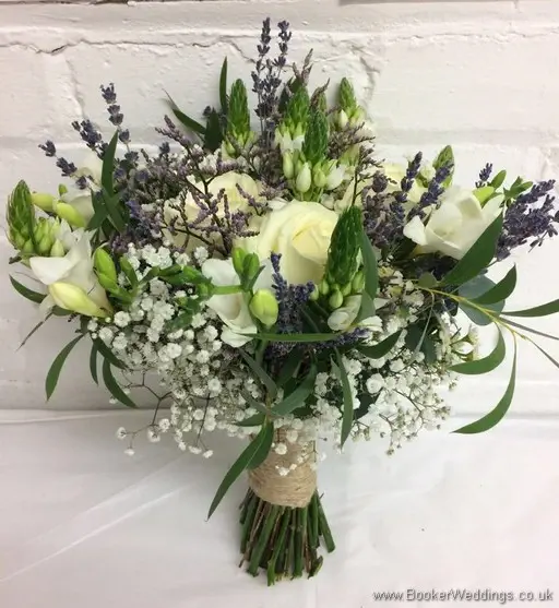 Semi-wild Bridal Bouquet with lots of texture, including roses, freesia, chinnies, lavender, gypsophila, wax flowers and eucalyptus Side View