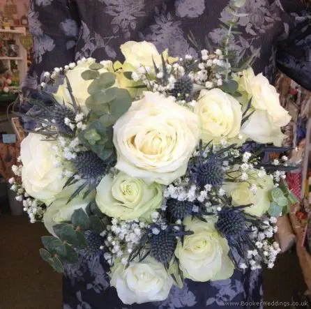 Hand Tied Bridal Bouquet with Cream and White Roses, Blue Eryngium Thistles and Gypsophila