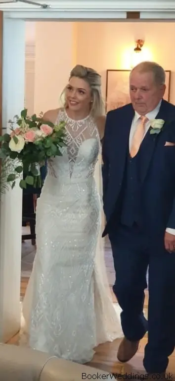 Bride and Dad with Ivory and Coral Wedding Flowers