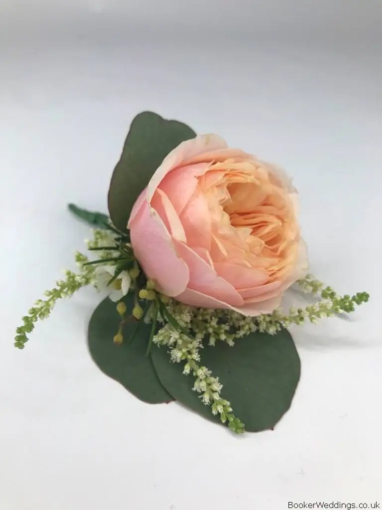 Buttonhole for Groom of Coral Rose.jpg