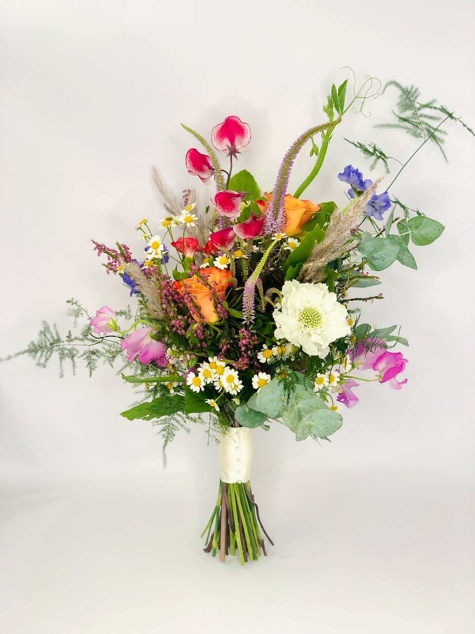 Bright Summer Meadow Bridesmaid Bouquet with Sweet Peas
