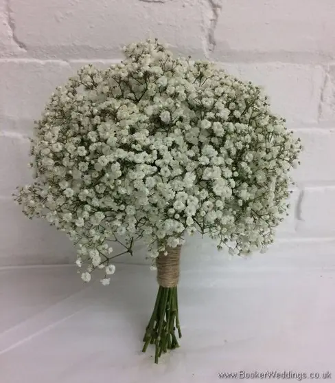 Rustic, country style all white gypsohila bridesmaid bouquet wrapped with string