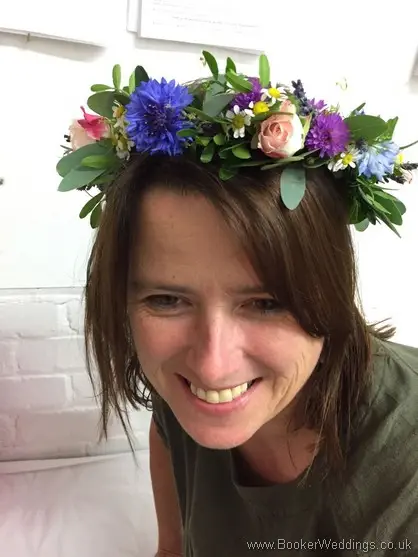 Bridal hair circlet containing Tanacetum, Aster, Cornflower, Nigela, spray roses, Lavender, Eucalyptus Front view