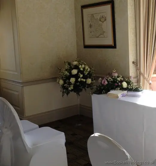 Ivory Roses and Waxflowers Martini Glass Aisle Arrangement and Ivory and Lilac Registrar Table Arrangement at Inglewood Manor
