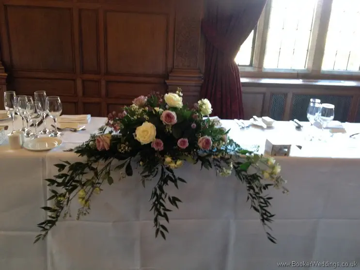 Long and Low Top Table Arranagement of Ivory and Lilac Roses