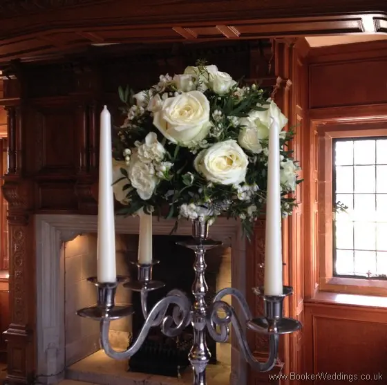 Tall Table Centrepiece of Ivory rose and Waxflower flower ball at Inglewood Manor