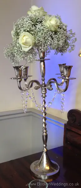 All White Rose and Gypsophila Tall Candelabra Arrangement at The Racquet Club