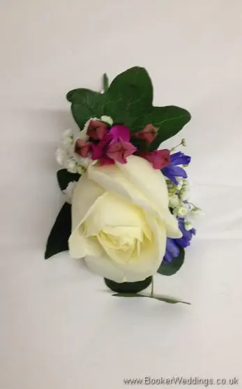 Grooms Buttonhole in Spring Mix Pinks Purples and Blues Wedding Flowers Theme