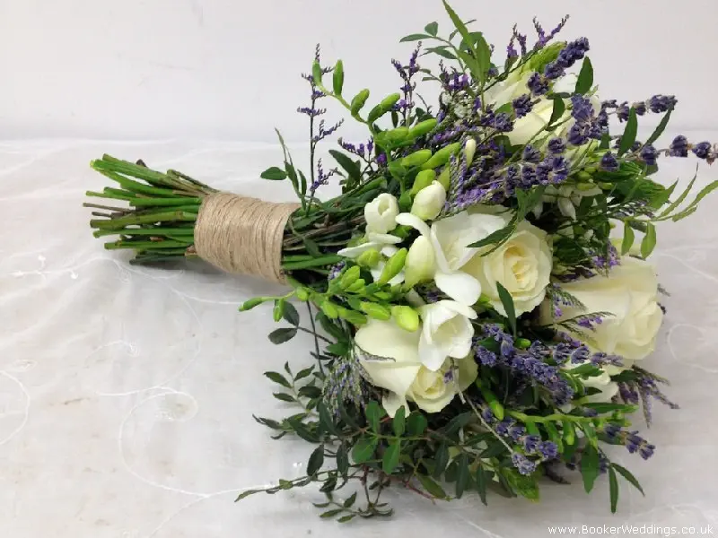 Textured Bridal Bouquet with white roses, freesia, chinnies, lavender, gypsy grass and limonium