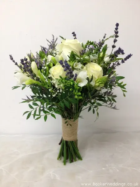 White and lavender bridal handtied bouquet with roses, lavender, freesia