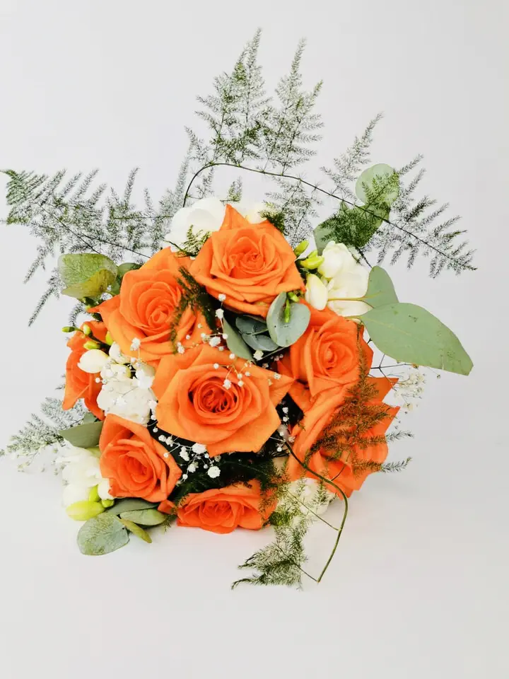 Orange Rose White Freesia and Eucalyptus Bride Bouquet