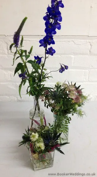 Purple & Blue English Garden Just Picked Table Centrepieces with Blue Delphinium, Purple Veronica, Astrantia, Eryngium and Nigella