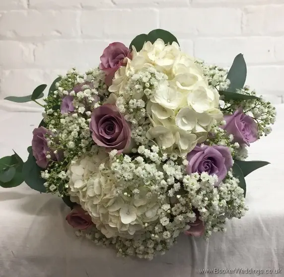 Handtied Bridal bouquet in cream and mauve including hydranges, roses and gypsophila_top