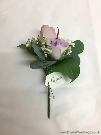 Mauve rose and gypsophila Grooms buttonhole