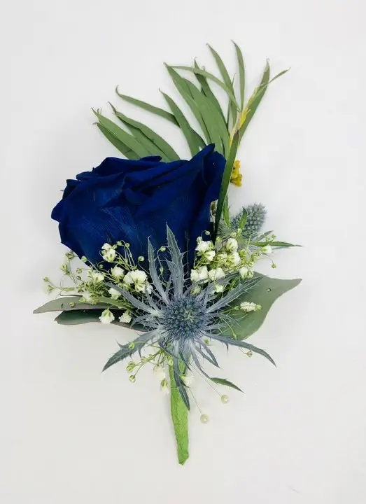 Royal Blue and Thistle Grooms Buttonhole